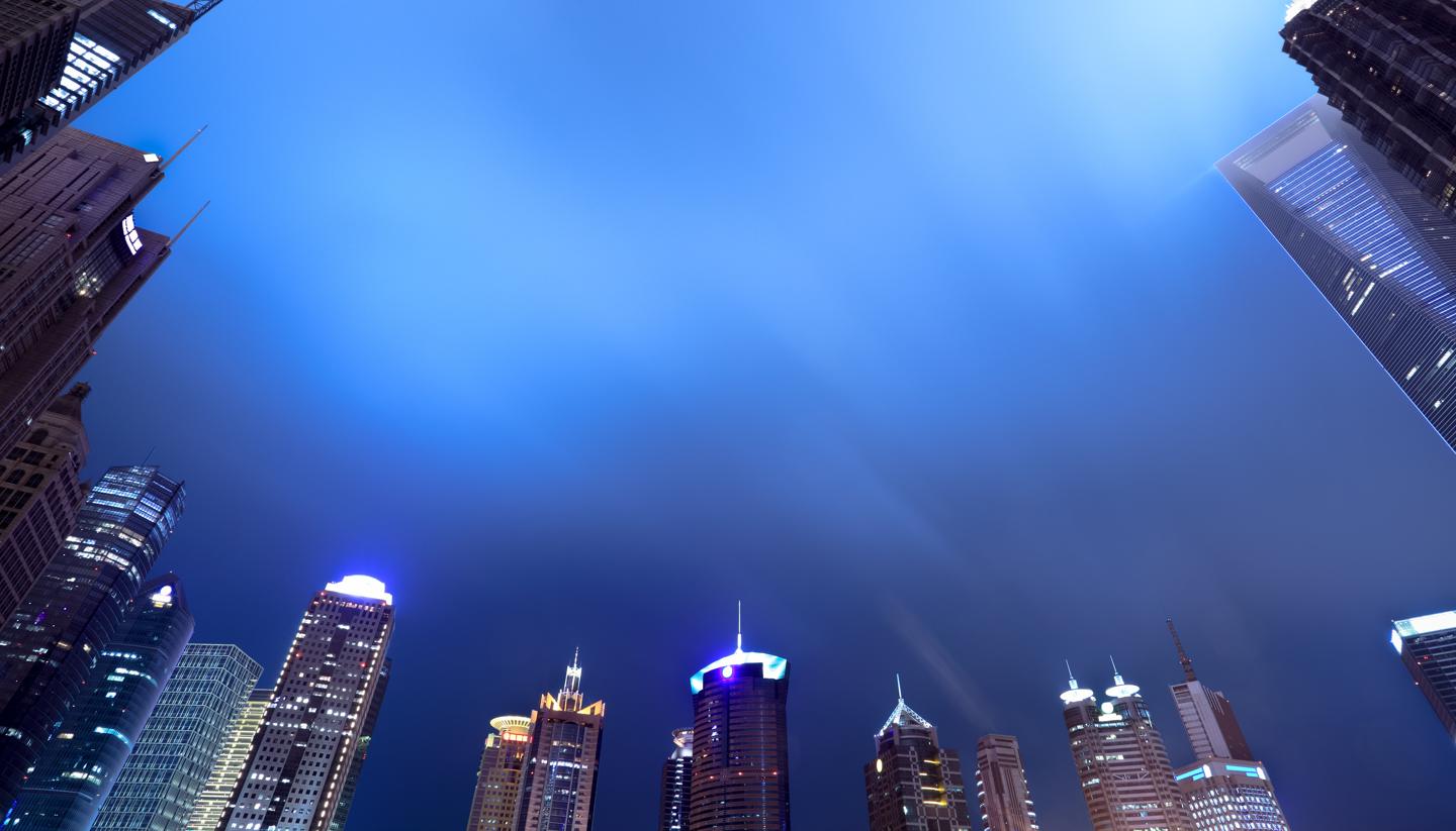 City Guides - Shanghai's skyline at night